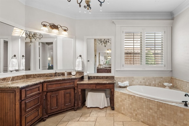 full bath featuring crown molding, vanity, stone tile floors, and a bath