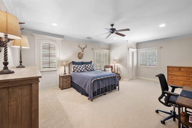 bedroom featuring visible vents, ornamental molding, baseboards, and light colored carpet