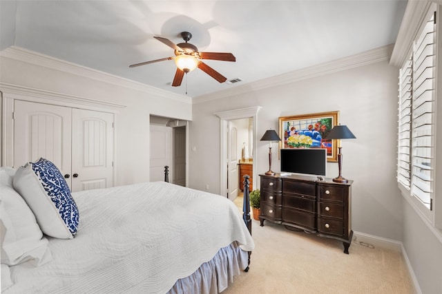 bedroom with light carpet, visible vents, baseboards, ornamental molding, and a closet