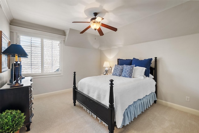 bedroom with light carpet, a ceiling fan, and baseboards