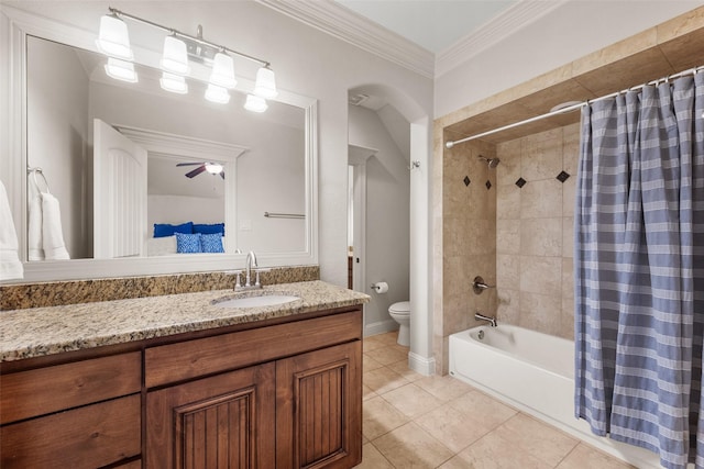 bathroom featuring toilet, ornamental molding, shower / bath combo, vanity, and tile patterned floors