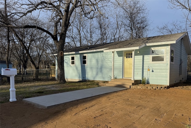 view of front of property with fence