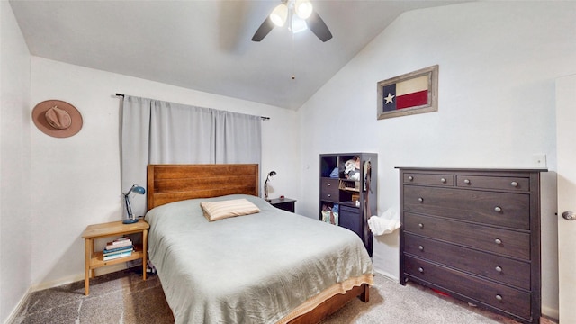 carpeted bedroom with lofted ceiling and ceiling fan