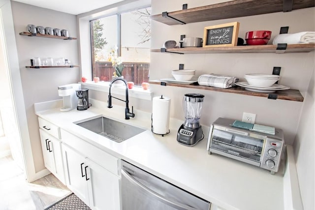 bar with dishwasher and a sink