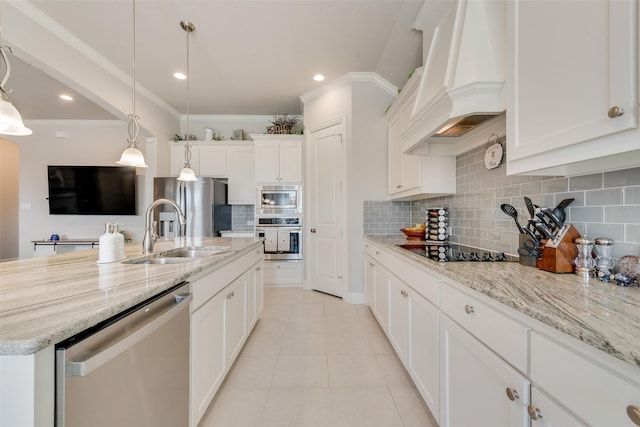 kitchen featuring light tile patterned floors, white cabinets, appliances with stainless steel finishes, custom exhaust hood, and a sink