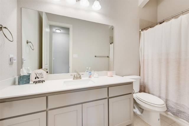 full bath with a shower with shower curtain, vanity, toilet, and tile patterned floors