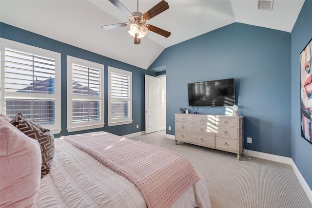 bedroom featuring carpet, lofted ceiling, visible vents, a ceiling fan, and baseboards