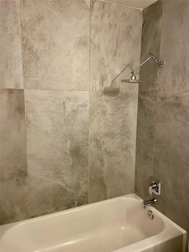 full bathroom with shower / washtub combination