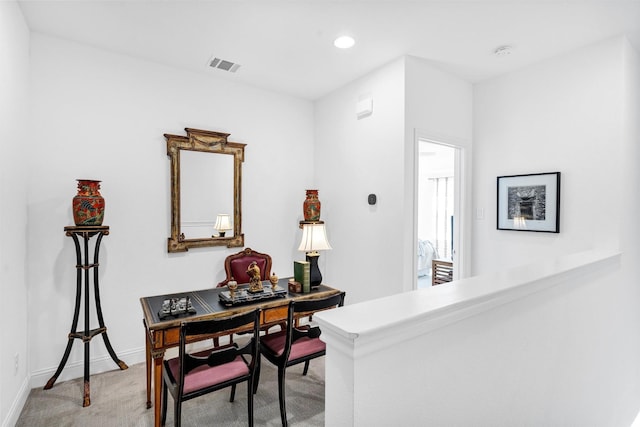 home office with recessed lighting, visible vents, light carpet, and baseboards