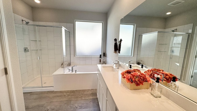 1908 Brindle St, Northlake, TX 76247 - bathroom featuring a shower stall, recessed lighting, a garden tub, and visible vents