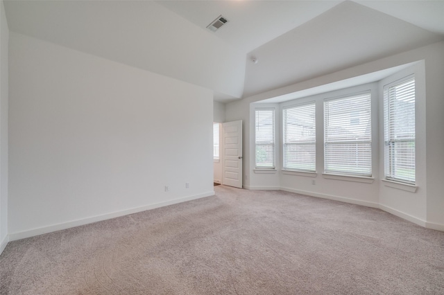 2009 Dappled Grey Ave, Aubrey, TX 76227 - empty room featuring light carpet and lofted ceiling