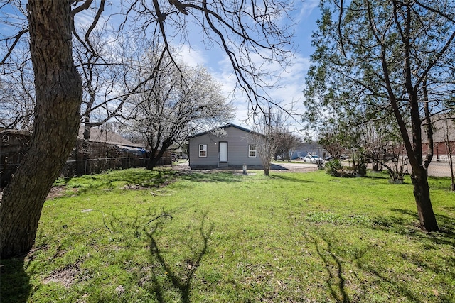 view of yard with fence