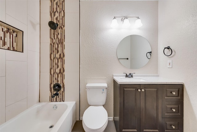 bathroom featuring shower / bathtub combination, a textured wall, vanity, and toilet