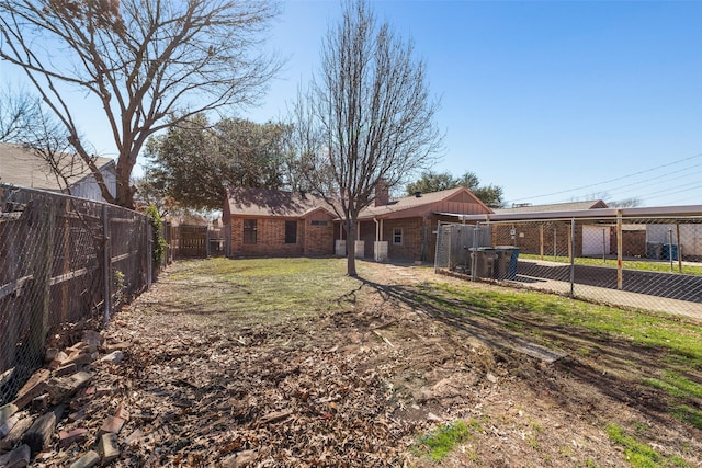 view of yard with a fenced backyard