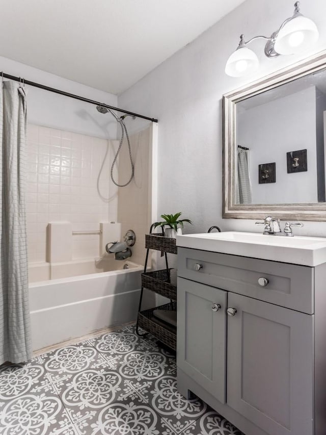 full bathroom featuring shower / tub combo with curtain, vanity, and tile patterned floors