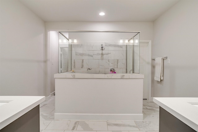 bathroom featuring marble finish floor, baseboards, a walk in shower, and vanity