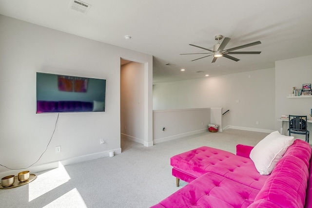 carpeted living room featuring baseboards, visible vents, a ceiling fan, and recessed lighting