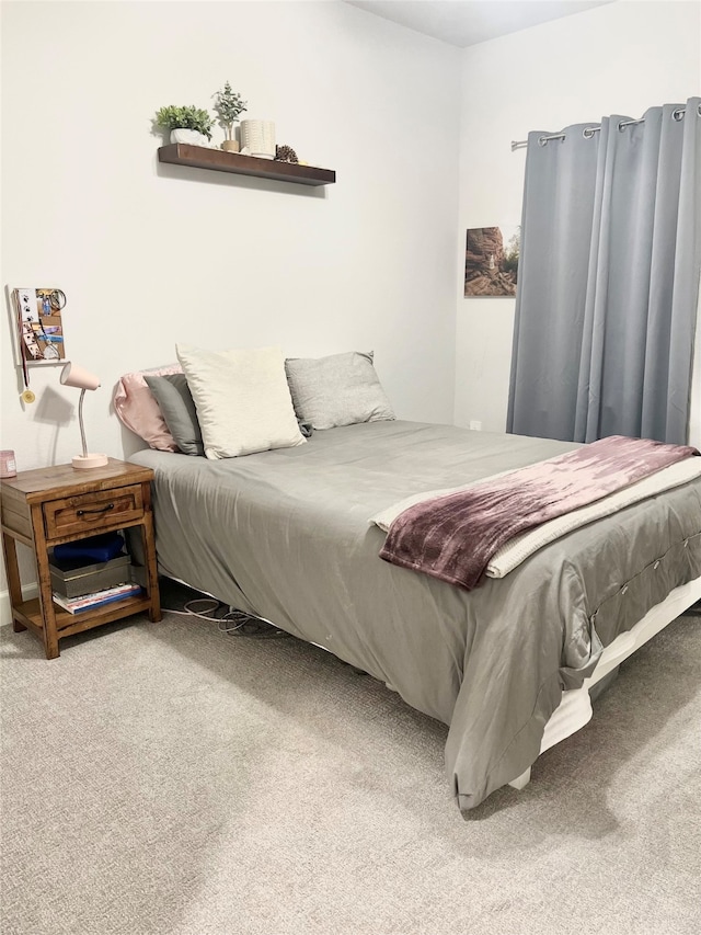 bedroom featuring carpet floors