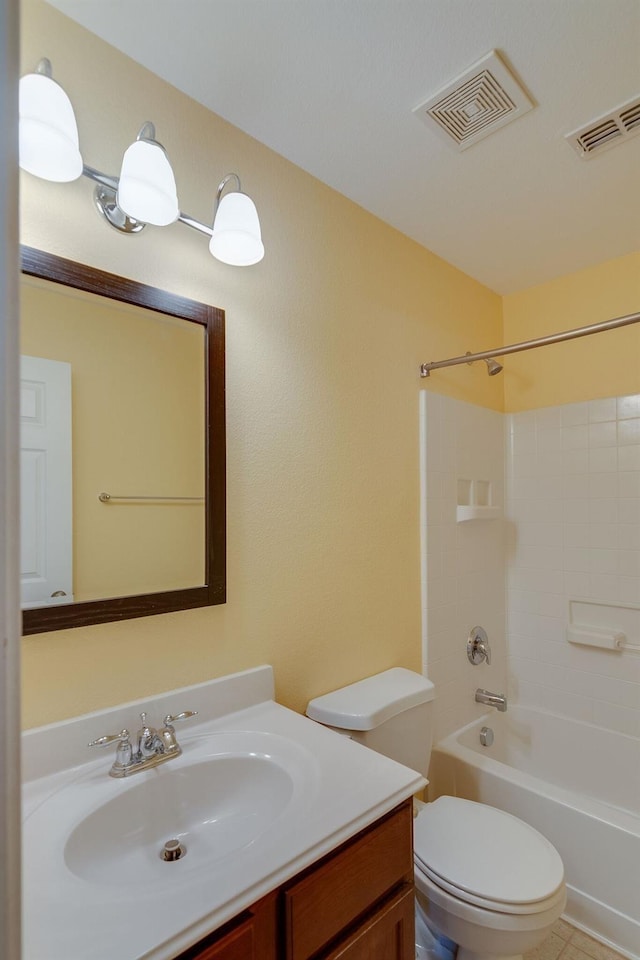 full bathroom with toilet, washtub / shower combination, visible vents, and vanity