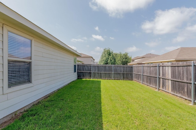 view of yard featuring a fenced backyard