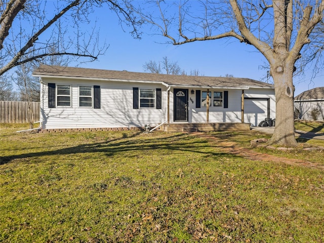 ranch-style home featuring entry steps, fence, an attached garage, and a front yard