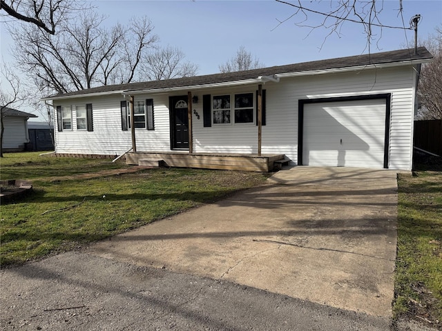 single story home with a garage, driveway, fence, and a front lawn