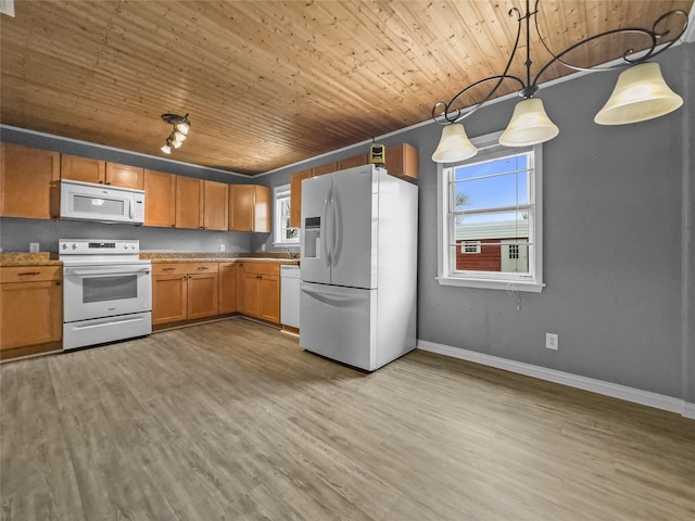 kitchen with wooden ceiling, white appliances, a wealth of natural light, and wood finished floors