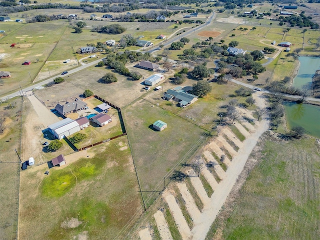 bird's eye view with a rural view and a water view