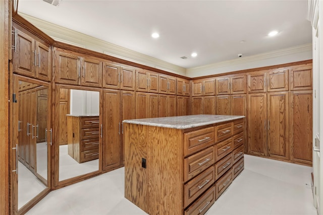 spacious closet featuring visible vents