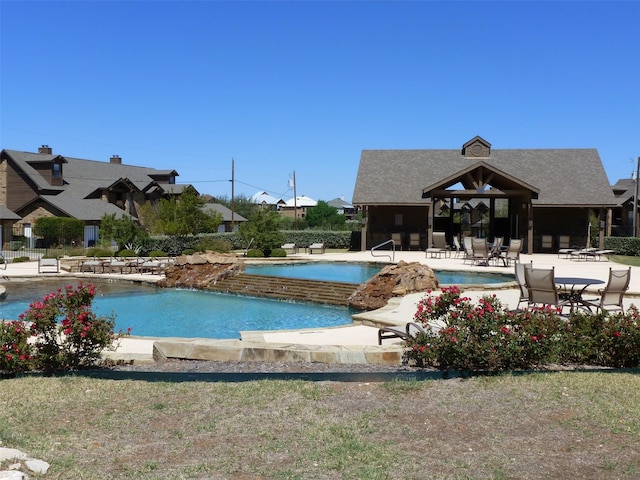 pool with a patio