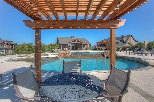community pool featuring a patio and a pergola