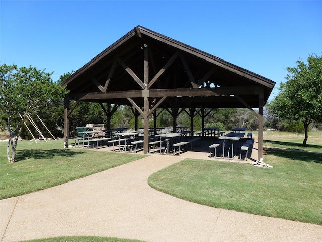 view of community with a lawn and a gazebo