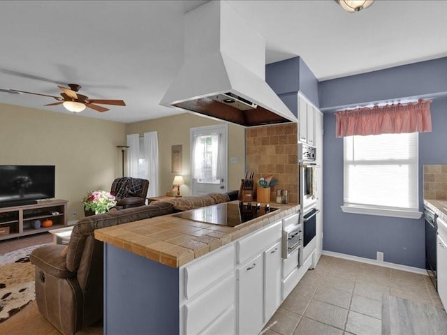 kitchen featuring decorative backsplash, custom range hood, open floor plan, a peninsula, and black electric stovetop