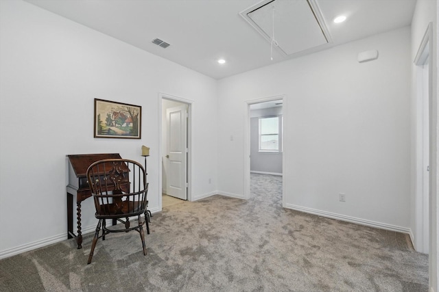 sitting room featuring attic access, visible vents, baseboards, carpet, and recessed lighting