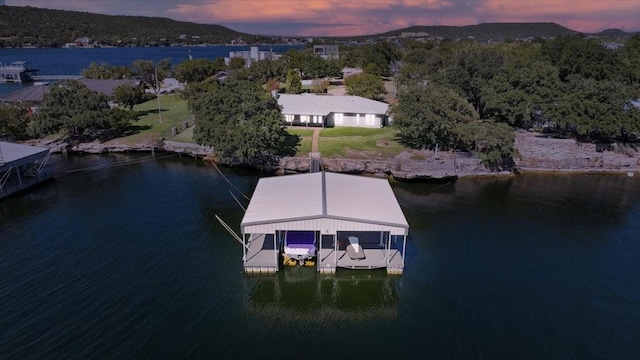 dock area featuring a water view and boat lift