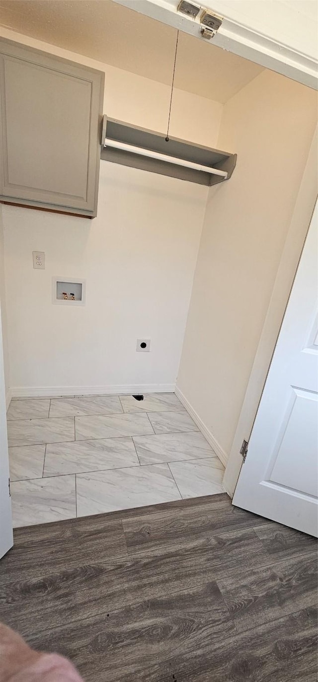 laundry room featuring hookup for an electric dryer, laundry area, washer hookup, visible vents, and baseboards