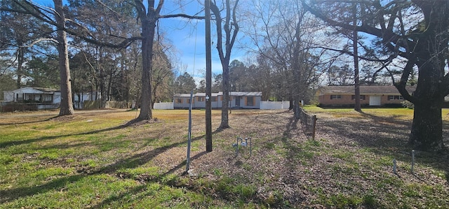 view of yard featuring fence