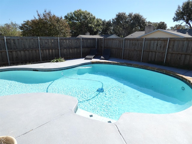 view of pool with a fenced in pool and a fenced backyard