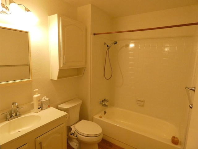 full bath featuring shower / bath combination, vanity, and toilet