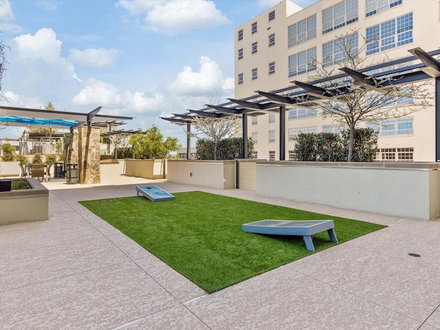 view of yard featuring a patio area and a pergola