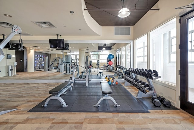 exercise room featuring visible vents