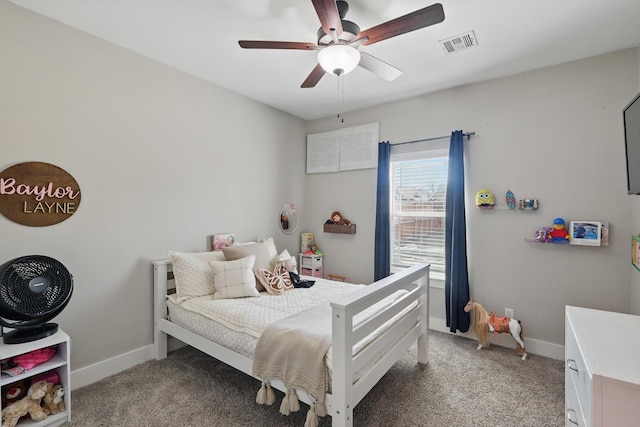 bedroom with baseboards, visible vents, ceiling fan, and light colored carpet