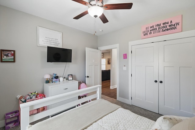 bedroom featuring a closet, ceiling fan, and baseboards