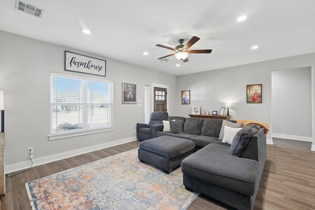 living room with recessed lighting, wood finished floors, a ceiling fan, baseboards, and visible vents