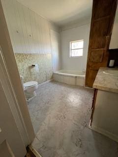 full bath with walk in shower, tiled tub, vanity, and toilet