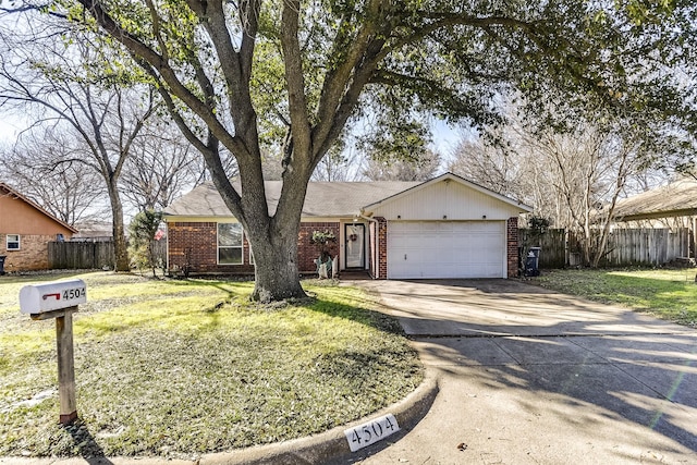 ranch-style home featuring brick siding, fence, a garage, driveway, and a front lawn