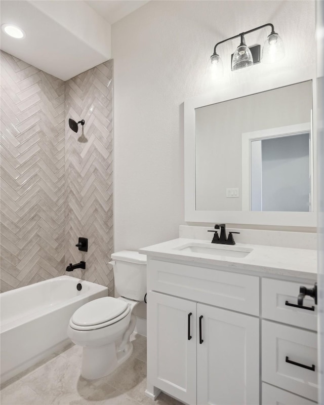 full bath featuring toilet, shower / washtub combination, and vanity