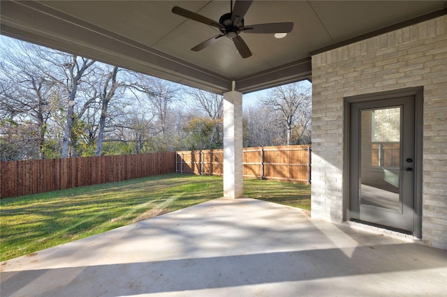 view of patio / terrace with a fenced backyard and a ceiling fan