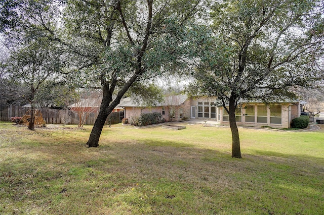 view of yard with fence