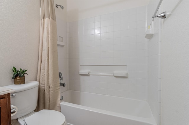 full bathroom featuring shower / tub combo, a textured wall, vanity, and toilet